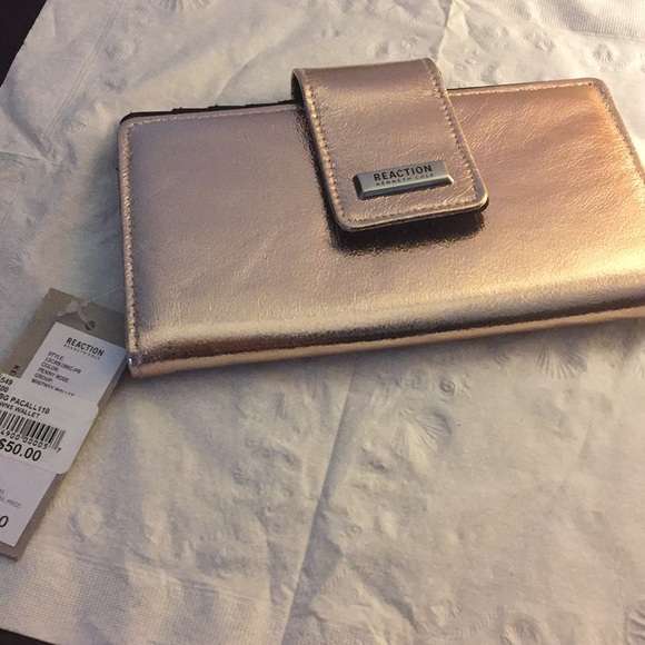 Reaction Kenneth Cole Handbags - NWT reaction Kenneth Cole wallet in penny rose
